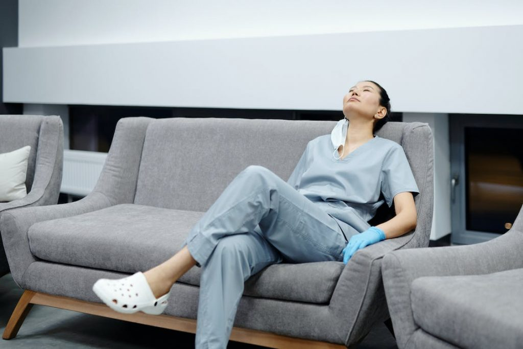 Nurse relaxing on a couch